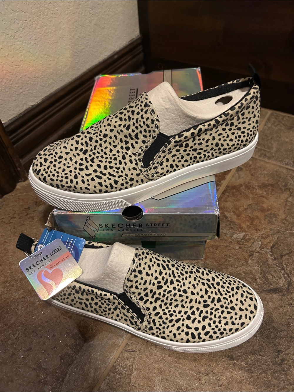Skechers Slip-On Sneakers in Beige and Black Dalmation Print